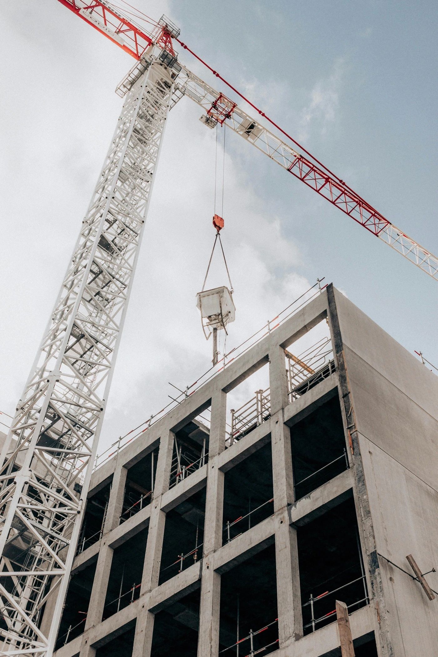 Crane lifting a load at a construction site